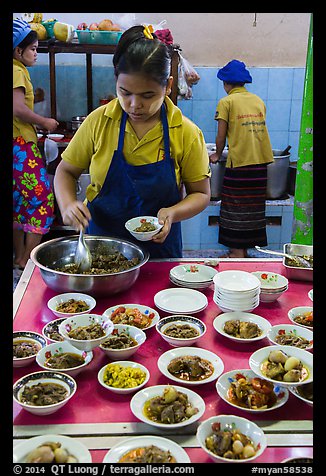 Cooks serving Burmese food. Bago, Myanmar (color)