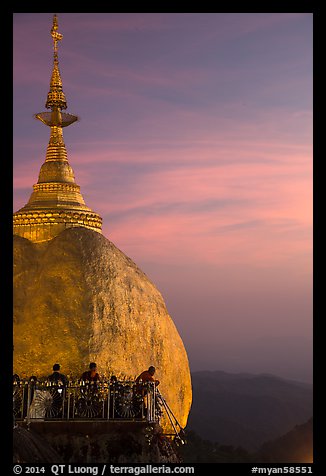 Sunset colors the sky above the Golden Rock. Kyaiktiyo, Myanmar (color)