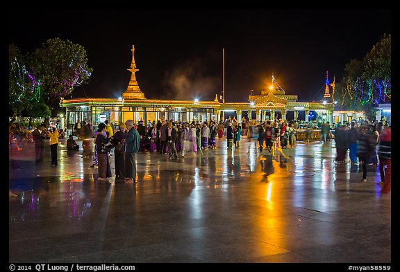 Crowds on main plaza at night. Kyaiktiyo, Myanmar (color)