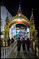 Entrance to Potemkin village of restaurants and souvenir shops. Kyaiktiyo, Myanmar ( color)