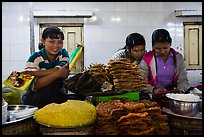 Food vendors reading, Potemkin village. Kyaiktiyo, Myanmar ( color)