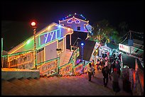 Colorfully lit guesthouses for Burmese people. Kyaiktiyo, Myanmar ( color)