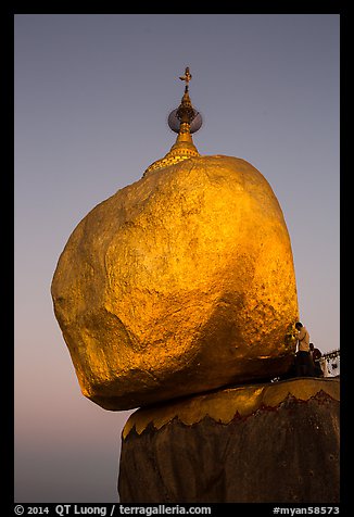 Golden rock gleaming at dawn. Kyaiktiyo, Myanmar (color)