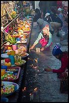 Morning food offering and pilgrims with cold weather hats. Kyaiktiyo, Myanmar ( color)