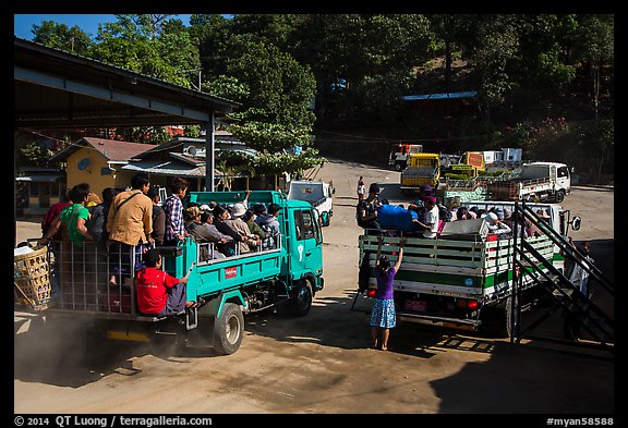 Trucks carrying pilgrims to the top. Kyaiktiyo, Myanmar (color)