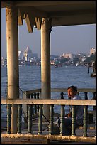 Man fishing on the Chao Phraya river. Bangkok, Thailand