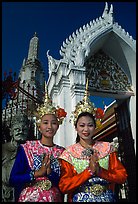 Girls in traditional thai costume, Wat Arun. Bangkok, Thailand
