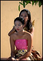 Mother helps daughter with traditional thai attire, Wat Arun. Bangkok, Thailand ( color)