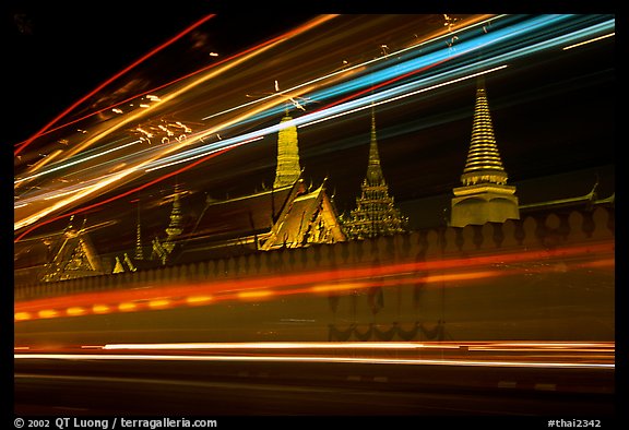 Wat Phra Kaew seen through the lights of traffic. Bangkok, Thailand