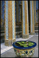 Lotus flowers and ornemented colunm, Wat Phra Kaew. Bangkok, Thailand