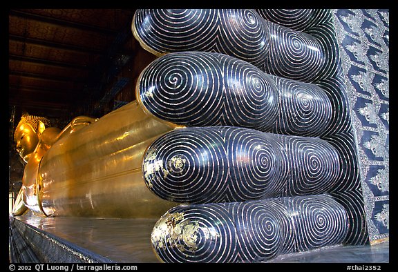 Largest reclining Budhha in Thailand, in Wat Pho. Bangkok, Thailand (color)