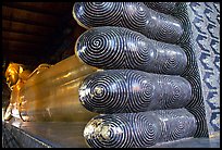 Largest reclining Budhha in Thailand, in Wat Pho. Bangkok, Thailand (color)