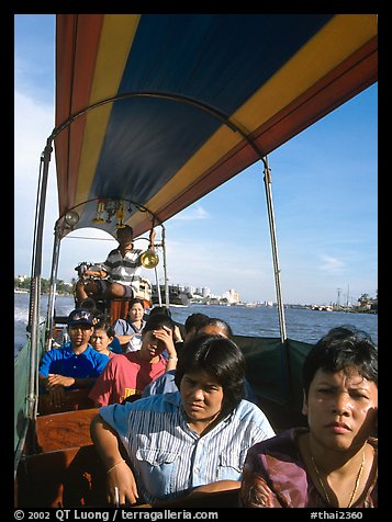 Aboard long tail taxi boat on Chao Phraya river. Bangkok, Thailand