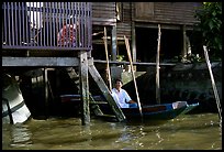 Conversation with neighbor along Thonbury canal. Bangkok, Thailand ( color)