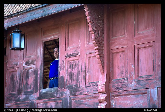 Man at window. Muang Boran, Thailand (color)