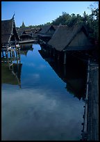 Village along canal. Muang Boran, Thailand (color)