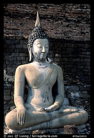 Classic sitting Buddha image, with boneless style typical of period. Sukothai, Thailand (color)