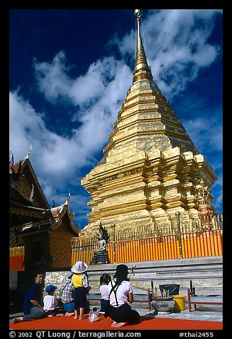 Worshipers at the Chedi of Wat Phra That Doi Suthep. Chiang Mai, Thailand (color)