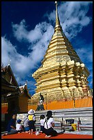 Worshipers at the Chedi of Wat Phra That Doi Suthep. Chiang Mai, Thailand