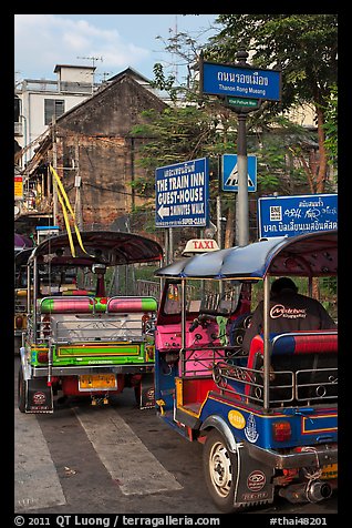 Tuk Tuks and signs. Bangkok, Thailand (color)