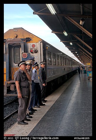 Attendants and train, Hualamphong station. Bangkok, Thailand