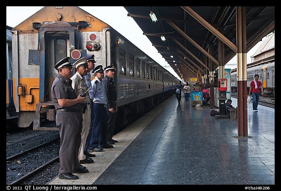 Train platform and attendants. Bangkok, Thailand