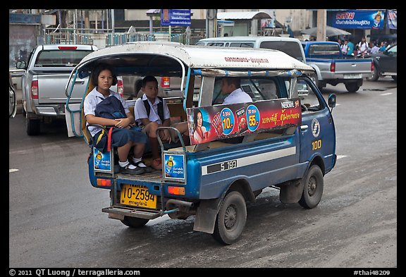 Schoolchidren in back of truck. Thailand