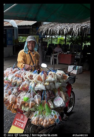 Food for sale on back of motorbike. Thailand (color)