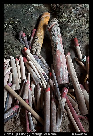 Carved wooden phalluses, Phranang cave, Rai Leh. Krabi Province, Thailand (color)