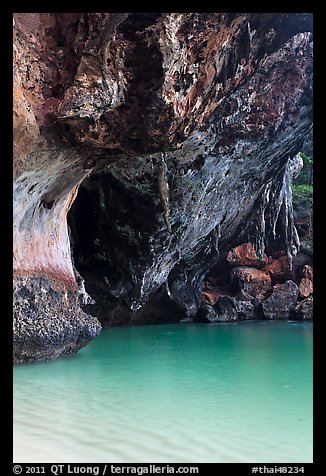 Limestone overhang and turquoise waters, Rai Leh. Krabi Province, Thailand