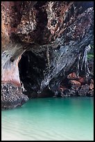 Limestone overhang and turquoise waters, Rai Leh. Krabi Province, Thailand