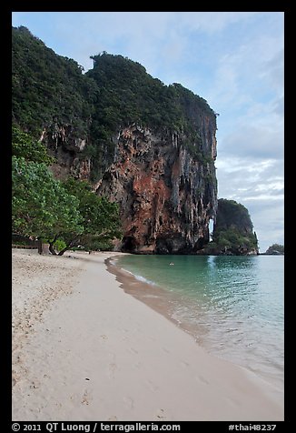 Pranang Cave Beach and limestone crag, Railay. Krabi Province, Thailand (color)