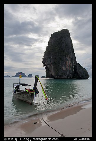Boat and limestone islets, Rai Leh. Krabi Province, Thailand (color)