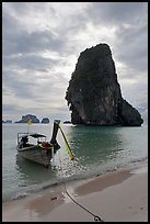 Boat and limestone islets, Rai Leh. Krabi Province, Thailand (color)