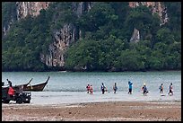 Disembarking at low tide, Rai Leh East. Krabi Province, Thailand (color)