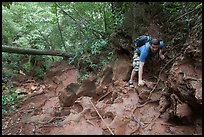 Hiker on steep trail, Laem Phra Nang, Rai Leh. Krabi Province, Thailand (color)