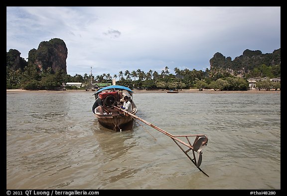 Tail of boat, and Railay East. Krabi Province, Thailand (color)