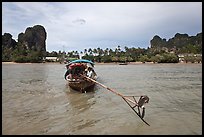 Tail of boat, and Railay East. Krabi Province, Thailand ( color)