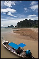 Boat and cliffs, Ao Nammao. Krabi Province, Thailand (color)
