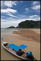 Boat and cliffs, Ao Nammao. Krabi Province, Thailand