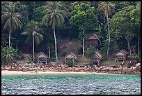 Beachfront huts and palm trees, Ko Phi-Phi Don. Krabi Province, Thailand