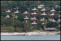 Beach and hillside bungalows on stilts, Ko Phi-Phi island. Krabi Province, Thailand