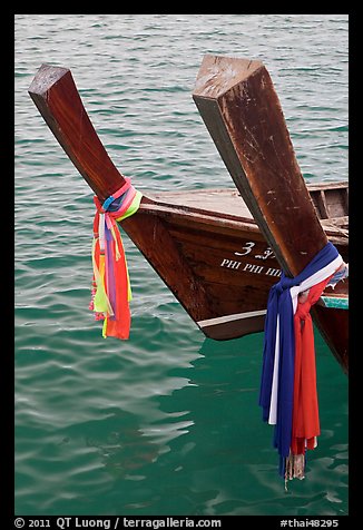 Ribons on prow of two longtail boats, Ko Phi-Phi Don. Krabi Province, Thailand