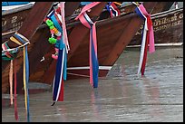 Prows of longtail boats with garlands, Ko Phi-Phi Don. Krabi Province, Thailand