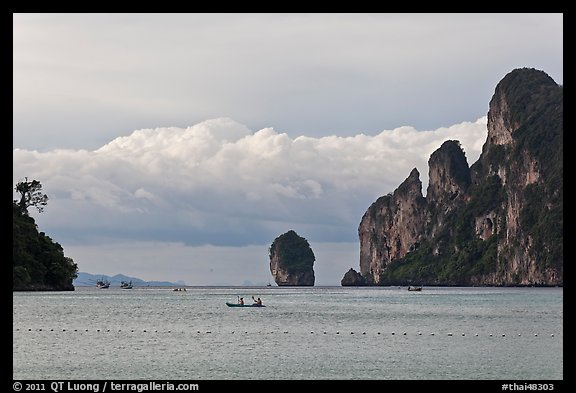 Distant boats and cliffs, Lo Dalam bay, Ko Phi-Phi Don. Krabi Province, Thailand (color)