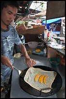 Man preparing thai pancake, Tonsai village, Ko Phi Phi. Krabi Province, Thailand ( color)