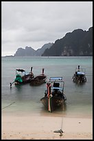 Beach and longtail boats in rainy weather, Ao Ton Sai, Ko Phi Phi. Krabi Province, Thailand ( color)