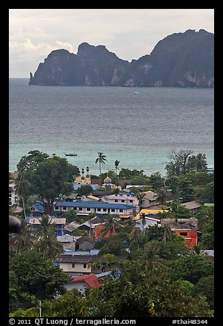 Village, bay and cliffs, Ko Phi-Phi island. Krabi Province, Thailand