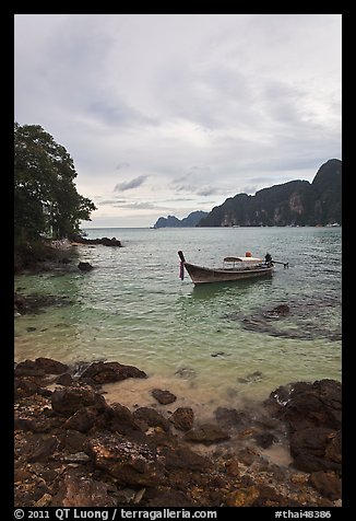 Boat in cove, Ko Phi-Phi island. Krabi Province, Thailand (color)