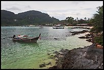 Long tail boat, and Tonsai village, Ko Phi-Phi Don. Krabi Province, Thailand ( color)